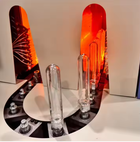 Blow molding machine heating assembly